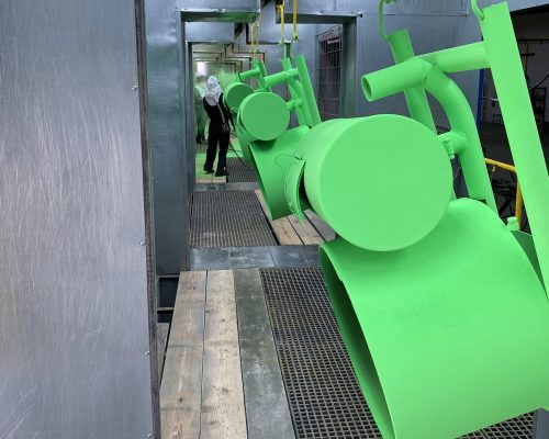Powder Coating Green Cylinder_Row of parts